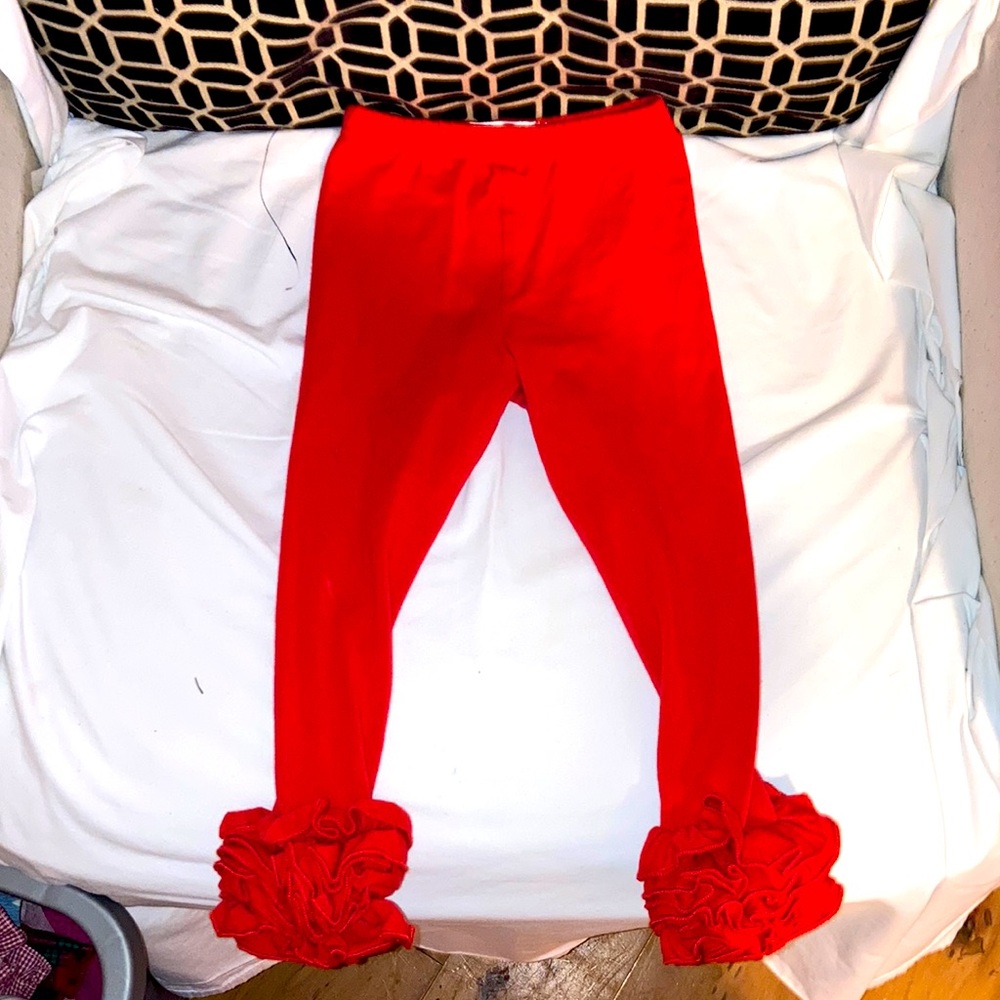 Leggings with ruffles at the bottom.